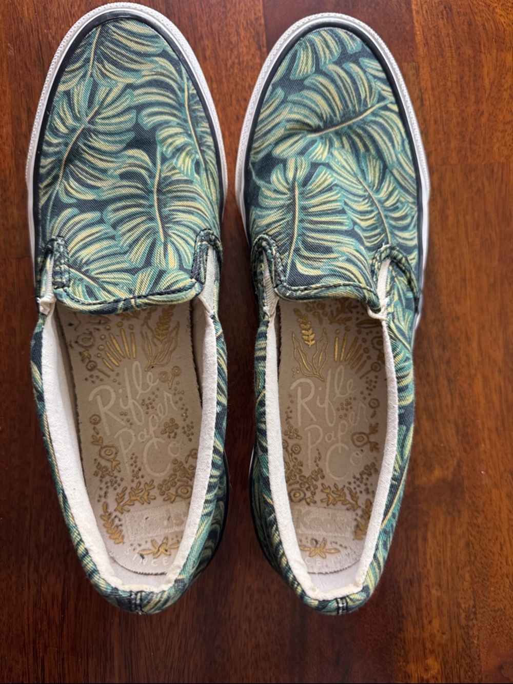 Keds Slip-On Sneakers with Beige Soles and White Canvas Sides